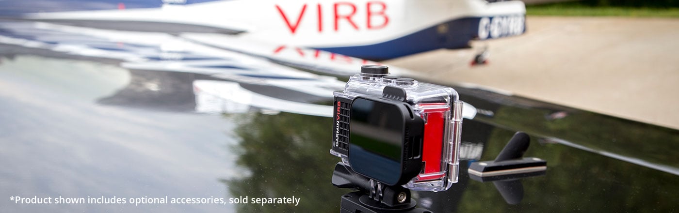 VIRB Ultra 30 montado no topo de uma asa de avião.  O produto mostrado inclui acessórios opcionais, vendidos separadamente.